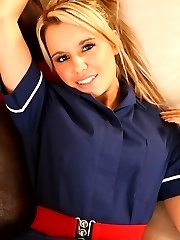 This naughty nurse bares all as she strips out of her tight blue minidress and heels.