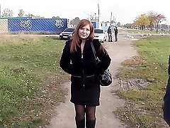 Hot redhead doing blowjob in the park