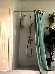 Naked chick gets filmed by shower spy cam