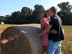 This hay bale is their bed today. Underneath the warm sun feels so natural for these horny teen...