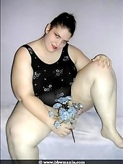 Big booty BBW girl in shiny black panties