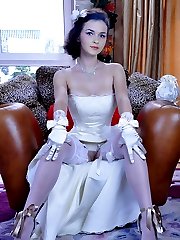 Lovely bride in a long wedding dress and expensive white nylons gets nasty