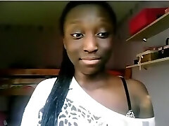 Black woman flashes her ass and big tits on cam