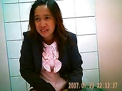 Hidden cam in thai office wc