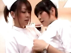 Young Nurse Petting Her Puss With Pen Her Colleauge Joins Her Kissing Rubbing Tits