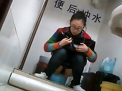 Nerdy chinese girl caught taking a leak