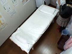 Big booty Japanese caught in a voyeur massage movie