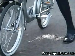 College Girl Busts on a Bike in Public! 