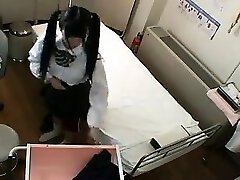 Adorable Asian schoolgirl with pigtails has a doctor fingering 