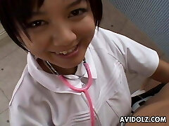 Asian nurse is sucking and titty poking the cock
