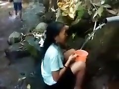 Indonesia woman outdoor nature shower