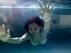 Young Japanese Gal in Sexy Bikini at a Swimming Pool