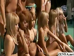 Suntanned group of Japanese teens pose for a braless pool photo shoot