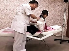 Pigtailed Japanese girl with perky bosoms gets massaged and f