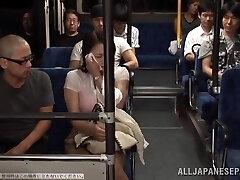 Two Guys Fucking a Busty Japanese Doll's Gigantic Boobs in the Public Bus
