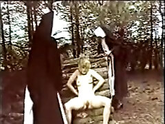 2 nuns chastise and abuse a juvenile beauty