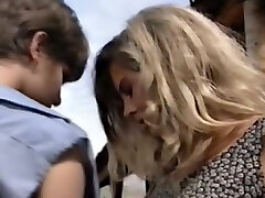 Gorgeous light-haired milf with sunglasses feels insatiable for a young country girl