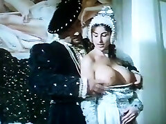 Two big boobed chicks take turns sucking my dick