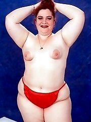 Plump in Red Panty Smiling and Squeezing Fat Tits