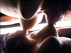 two chinese girls titty sucking each other's melons NICE