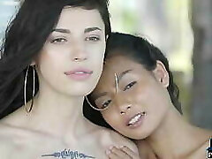 Petite Chinese and Russian teen lesbians outdoor posing Petite Chinese and Russian teen lesbians outdoor posing