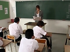 Professor Yuuno Hoshi gets mad at her class then sucks multiple cocks