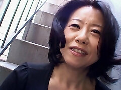 Insane Japanese granny Junko Sakashita stretches her legs to be dicked