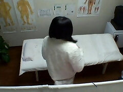 Huge-boobed Asian getting the deep vaginal massage on voyeur cam