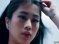 Surfer guy pokes an asian beauty