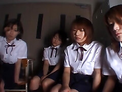 Four Chinese school girls spitting on teacher