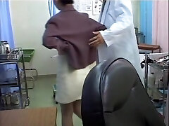 Kinky doc dildo penetrates Japanese in the medical office