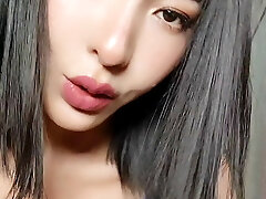 Famous Japanese actress Elise in blue stockings underwear.  DD natural milky asian tits.