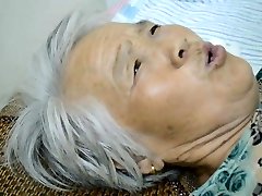 Chinese Grannie With Painful Orgasm