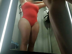 Damsel caught on public camera getting dressed