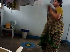 Indian inexperienced housewife was caught on hidden cam while undressing