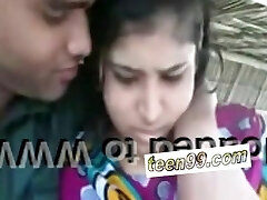 Indian village girl kissing boyfriend in outdoor scandal - teen99*com