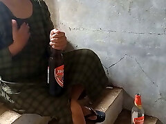 Desi local rendi outdoor gulping beer pissing beer bottle