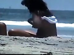 Nude couple at the beach