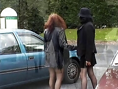 Two babes flashing their bra-stuffers and pussy in public place