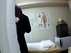 Hidden spy cam massage turns into fingering a girl's vagina