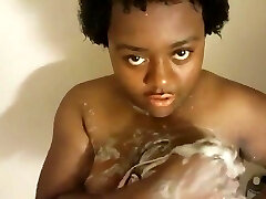 kinky chubby black nanny teasing solo play in shower