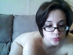 woman with glasses on webcam part Two