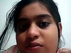 Emotional amateur Desi web cam slut is happy about fingering herself
