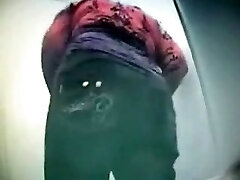 Hidden cam video caught big ass of Russian brunette in the public toilet