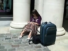 Cool girl sitting outside had beautiful cameltoe between her legs
