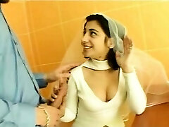 Sexy brunette indian bride talking with a guy