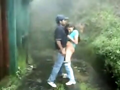 British Indian couple nail in rain storm at hill station