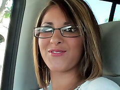 Seductive blonde chick wearing glasses leads dirty talks in the van