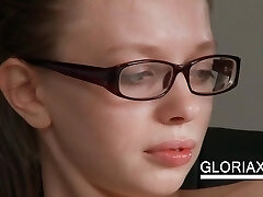 Teen with glasses shows gash