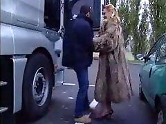Blonde Cougar in Fur Coat Sucks Off Trucker